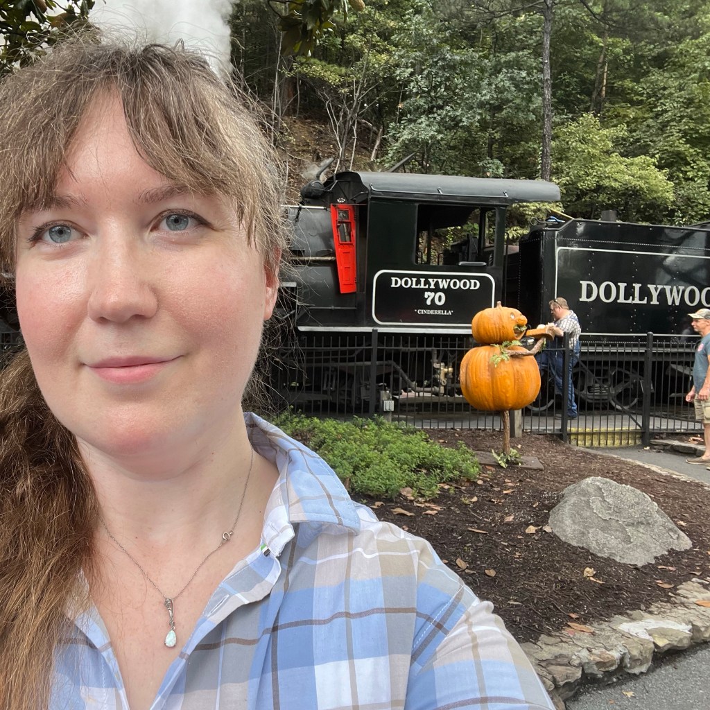 Alex in front of the train at Dollywood