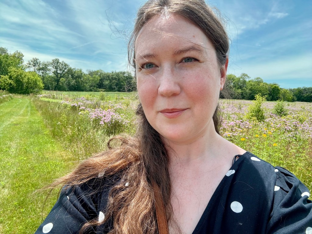 Alexandra Bomhoff in a meadow at Cedar Rock State Park in Iowa.
